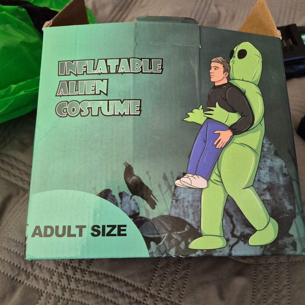 Halloween Costume Morph Adult Alien Pick Me Up Inflatable alien carrying a human